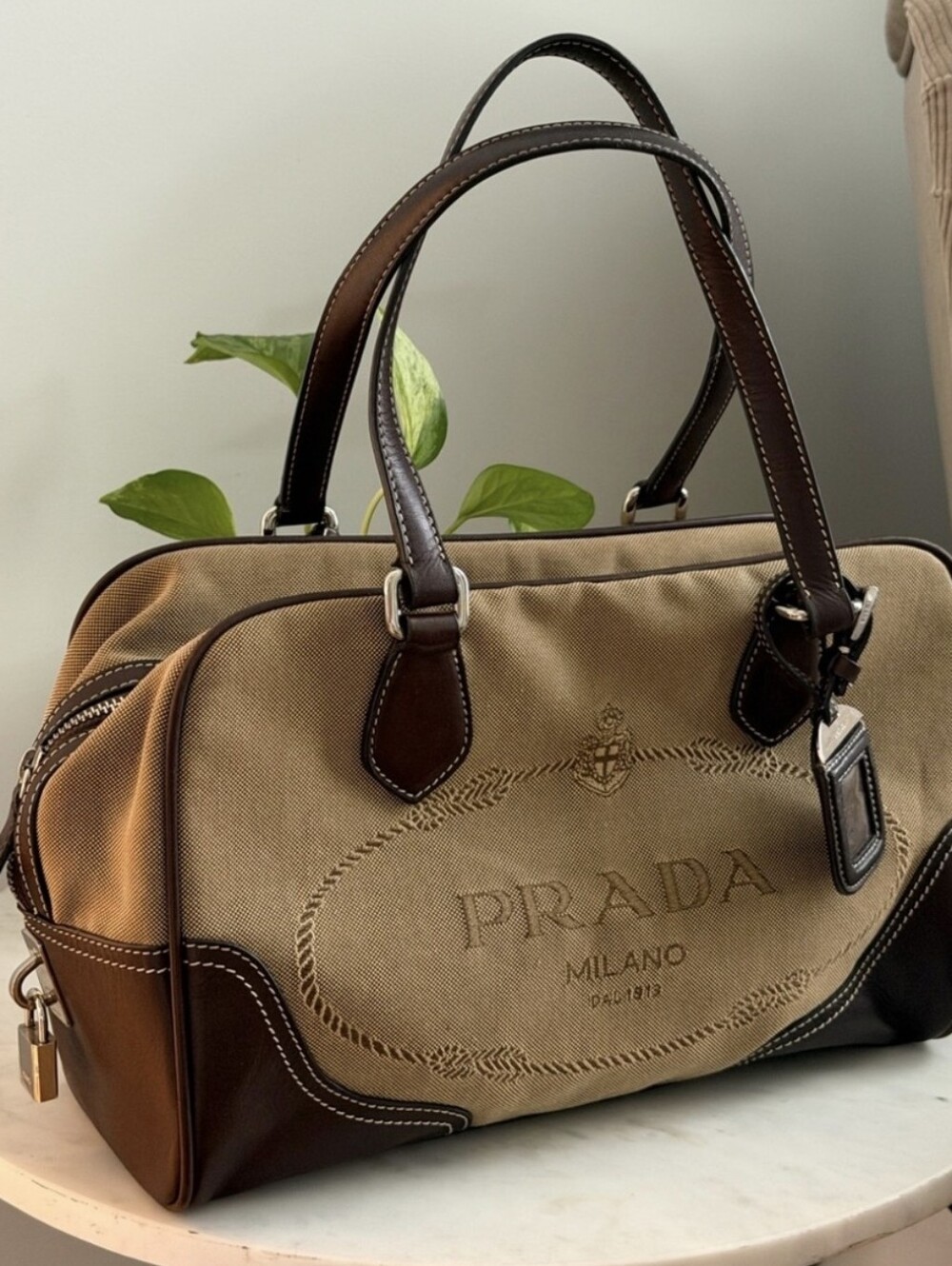 Authentic Prada Beige Canvas Duffel with Black Leather Trim